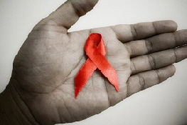 HIV ribbon in hand